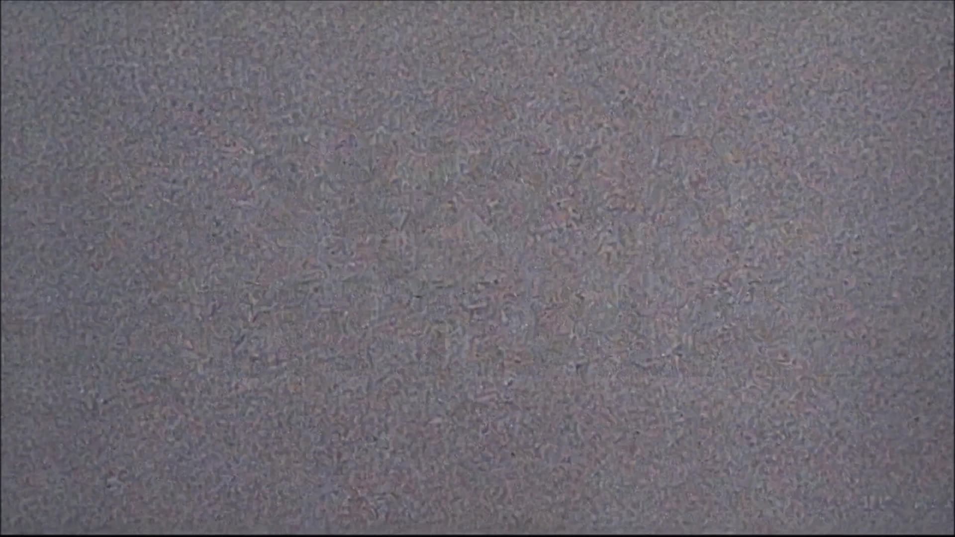 The title beginning to surface in the static